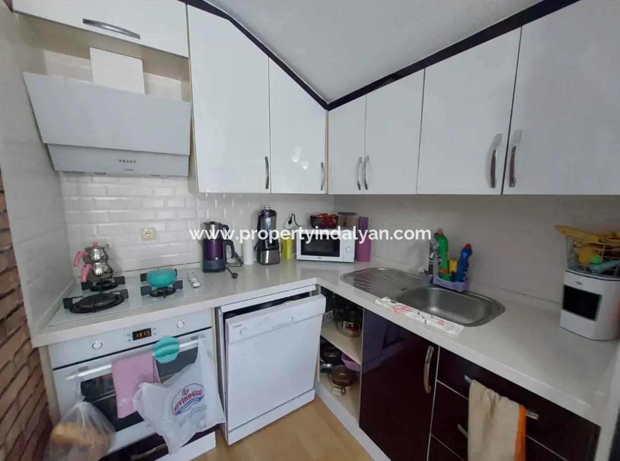 A House With 4 1 And 3 1 Swimming Pools On 645 M2 Land In Ortaca Kemaliye Is For Sale Or Exchange.