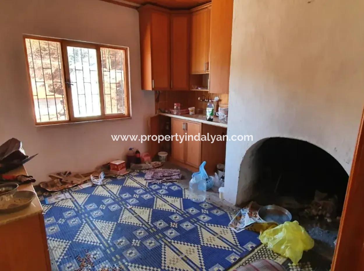 Denizli Çameli Ericekte İçinde 2 Adet Ev Bulunan Arazi Satılık