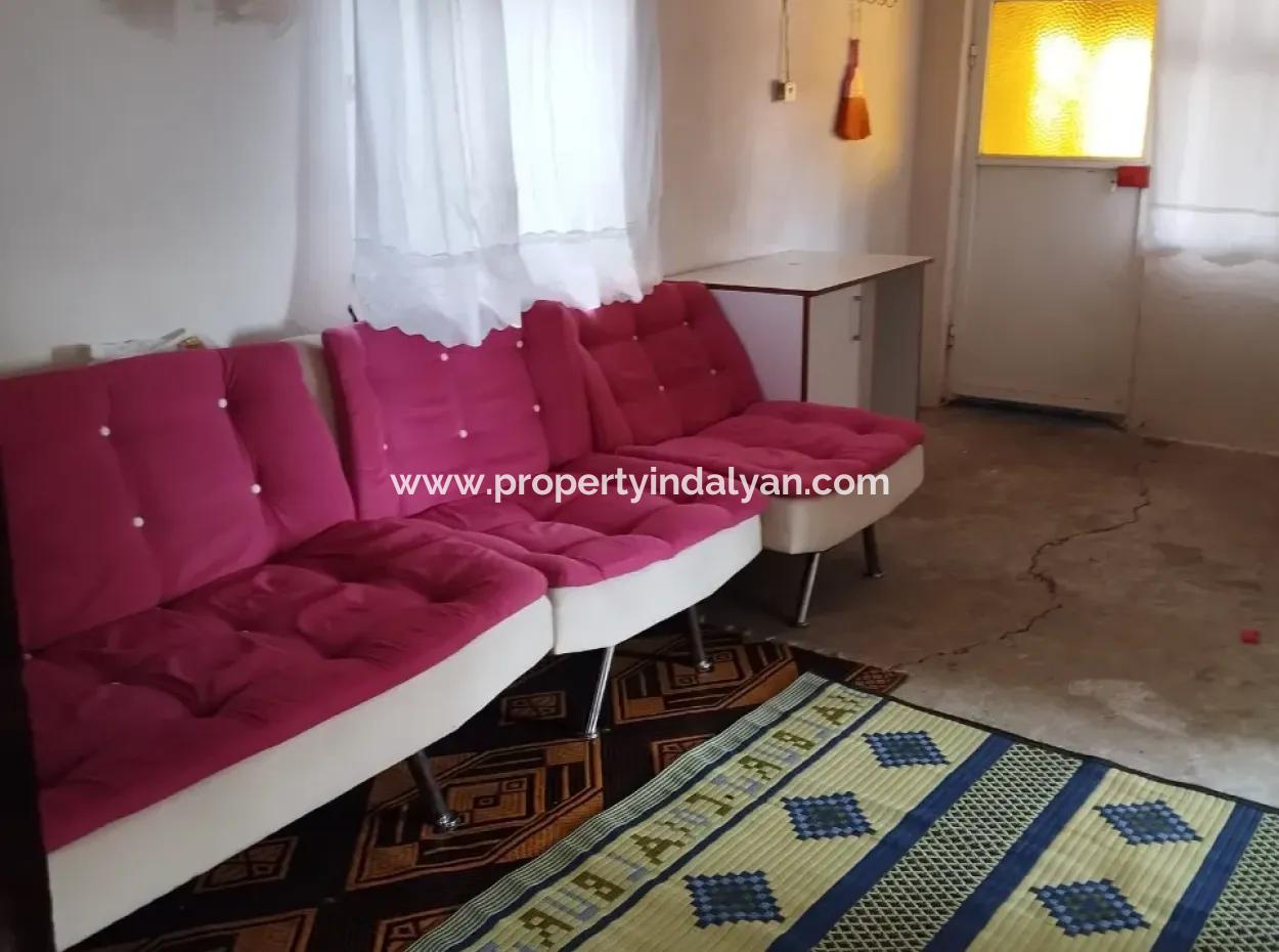 Muğla Ortaca Sarıgerme Merkezde  485 M² İmarlı Satılık Arsa – Köy Evi + Depolu