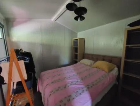 Ortaca Okçular’da 21 M² Eşyalı 1+1 Konteyner Ev – Yıllık Kiralık