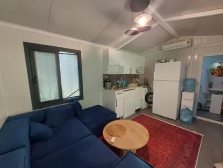 Ortaca Okçular’da 21 M² Eşyalı 1+1 Konteyner Ev – Yıllık Kiralık